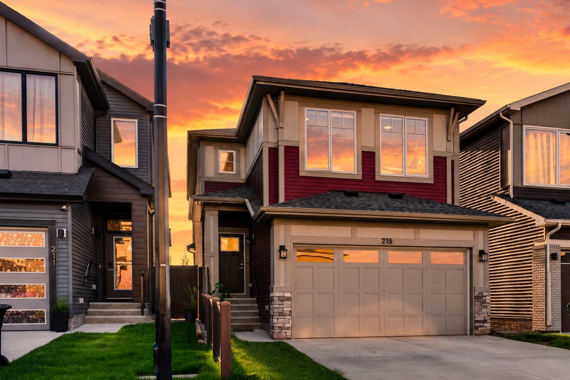 Front elevation and double garage, 215 Mallard Grove SE