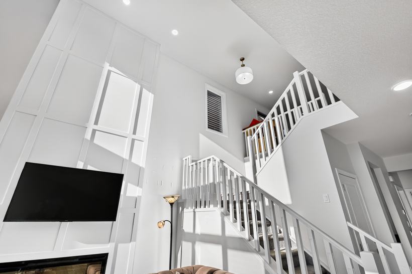 The fireplace wall, carried up, 215 Mallard Grove SE