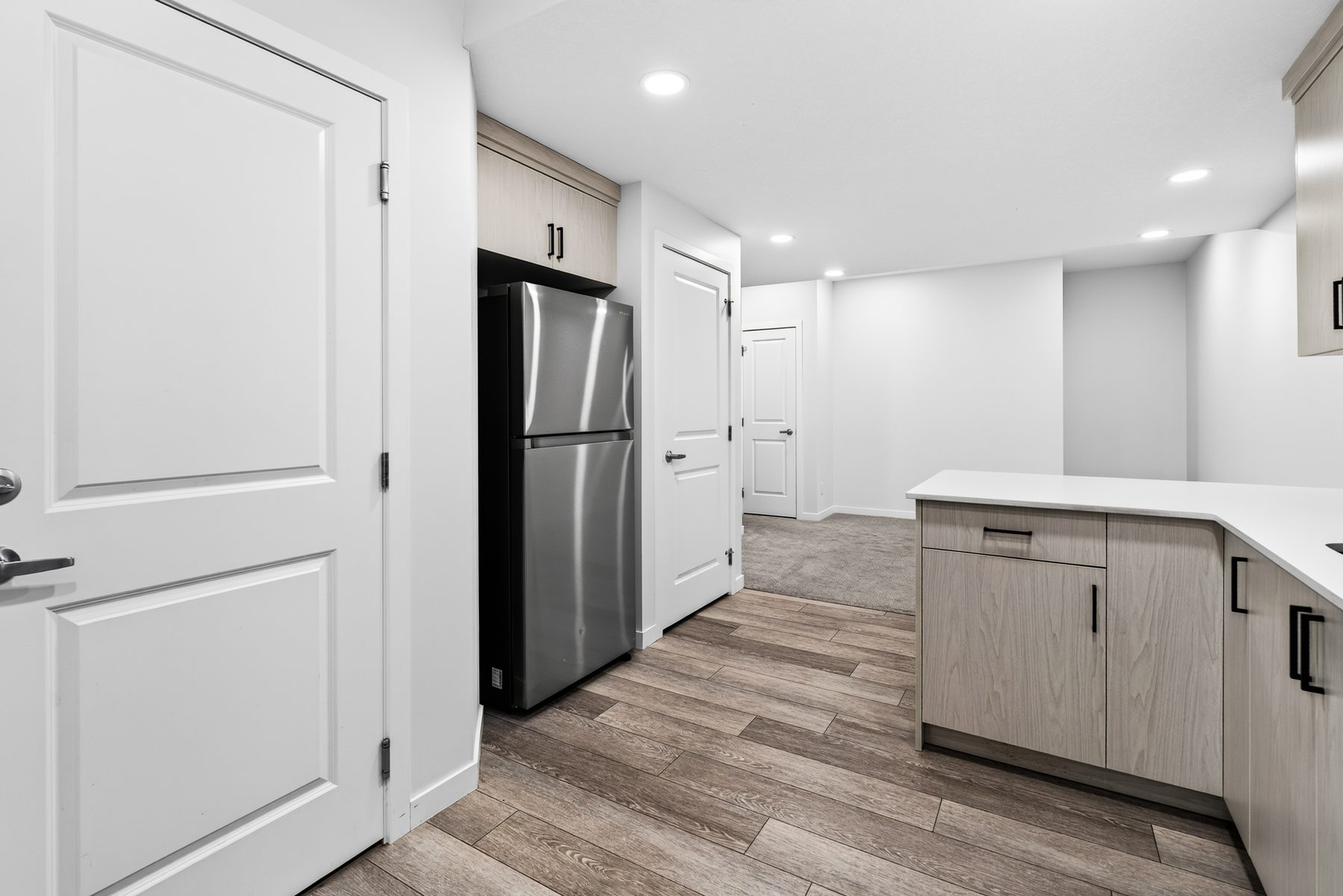 Suite kitchen and entrance, 215 Mallard Grove SE