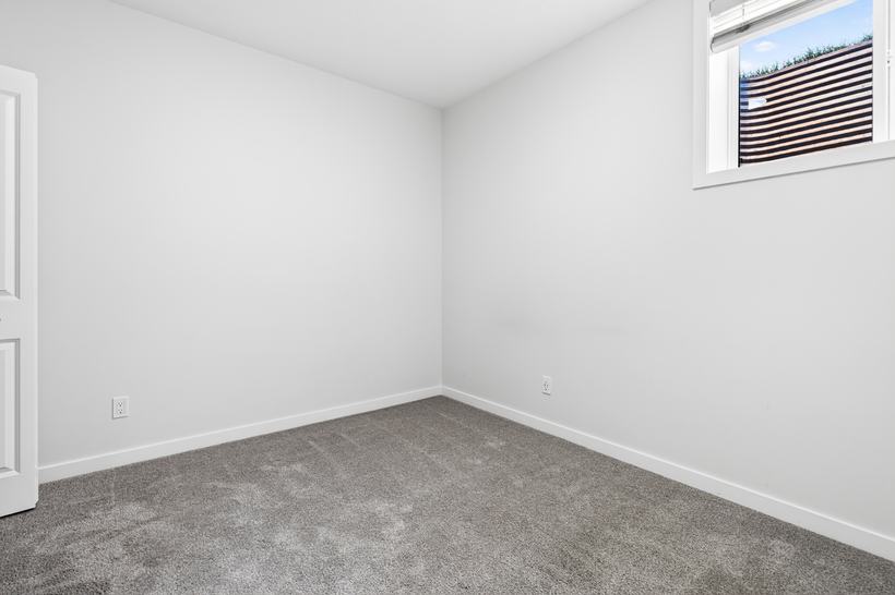 Suite bedroom one, 215 Mallard Grove SE